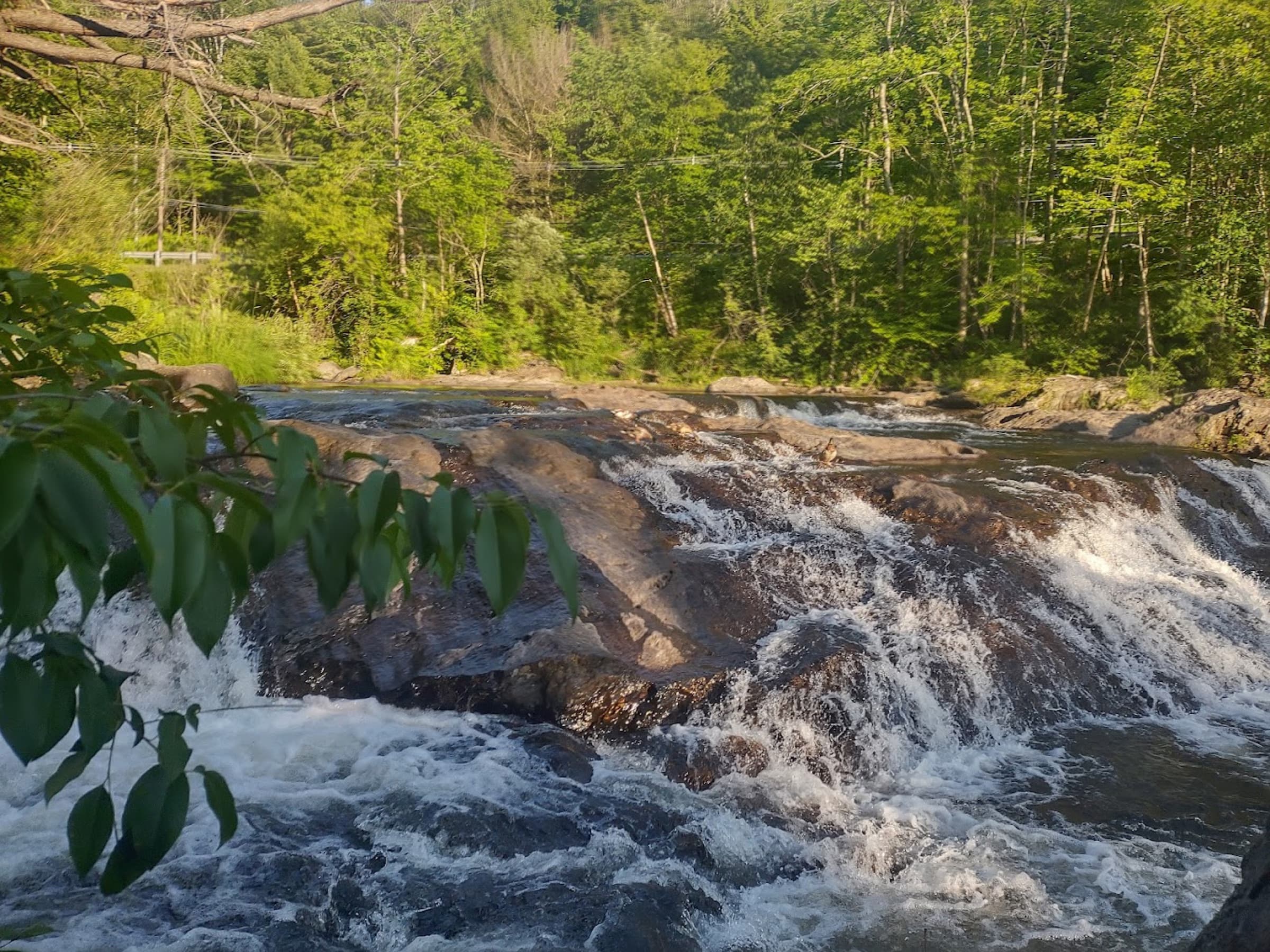 Low ledge cascade and rock shelf at Beard Recreation Park on the Gihon River.